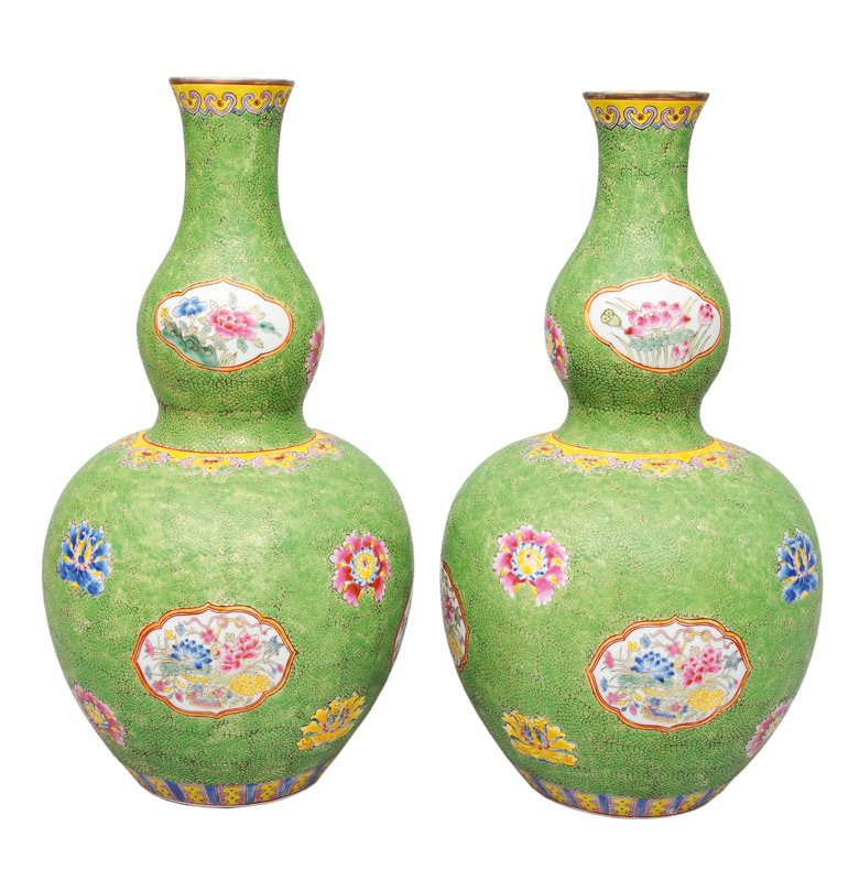 A pair of double-gourd vases with apple-green underground