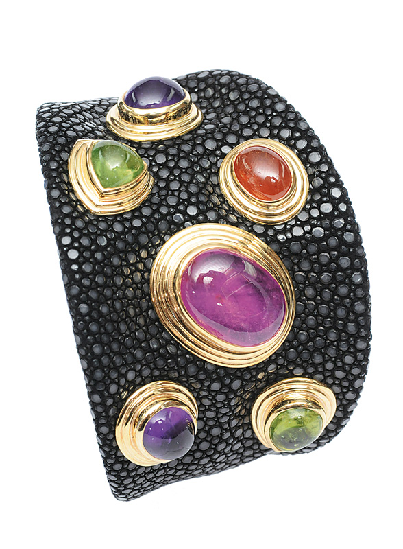 A bangle bracelet with high carat ruby, amethyst and citrine