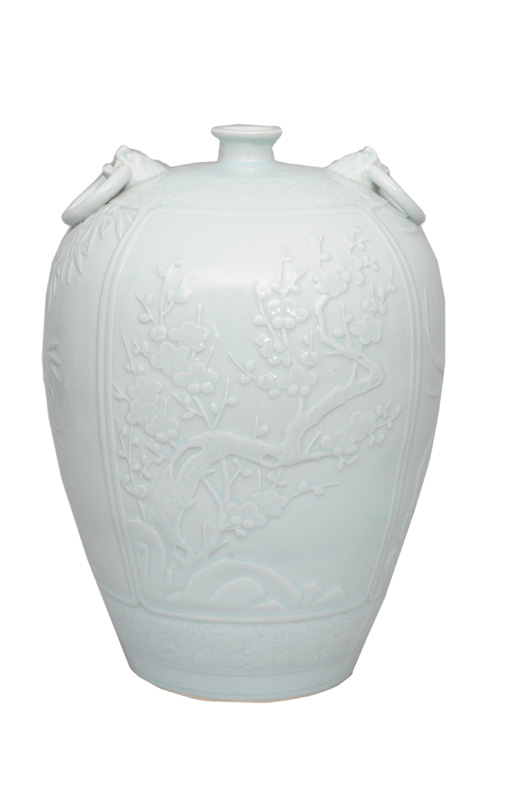 A tall Mei-Ping-vase with relief decoration A tall Mei-Ping-vase with relief decoration