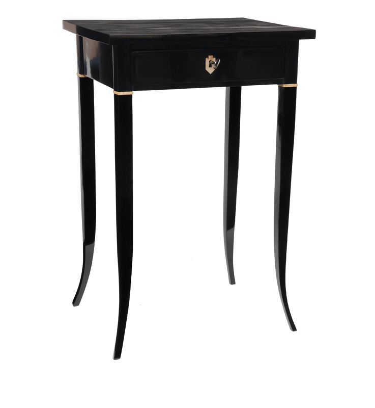 A black laquered side table