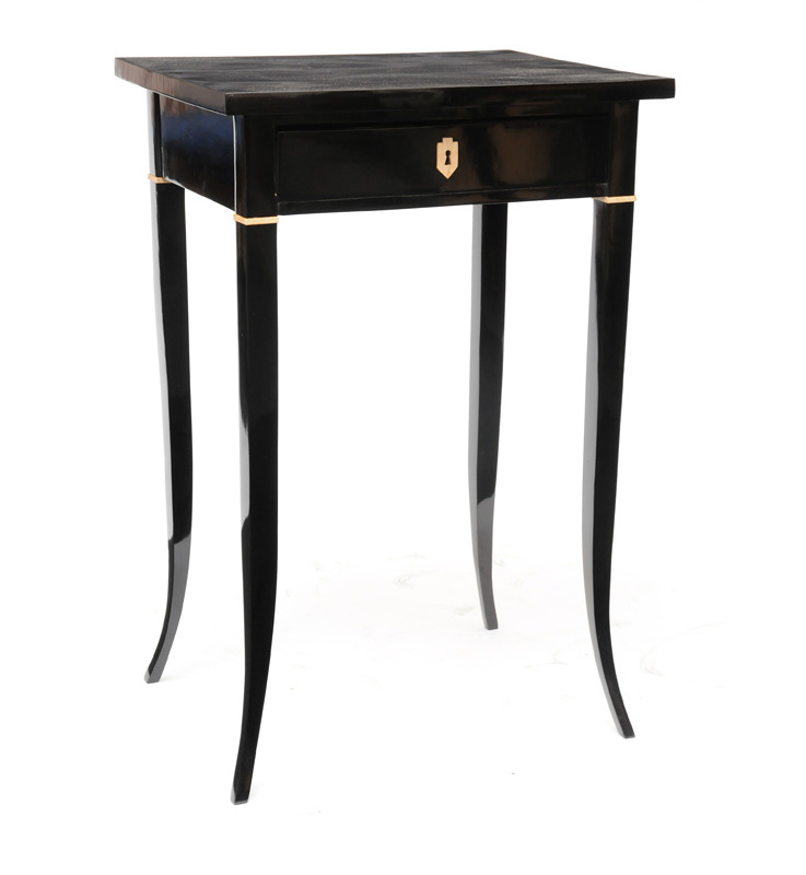 A black laquered side table