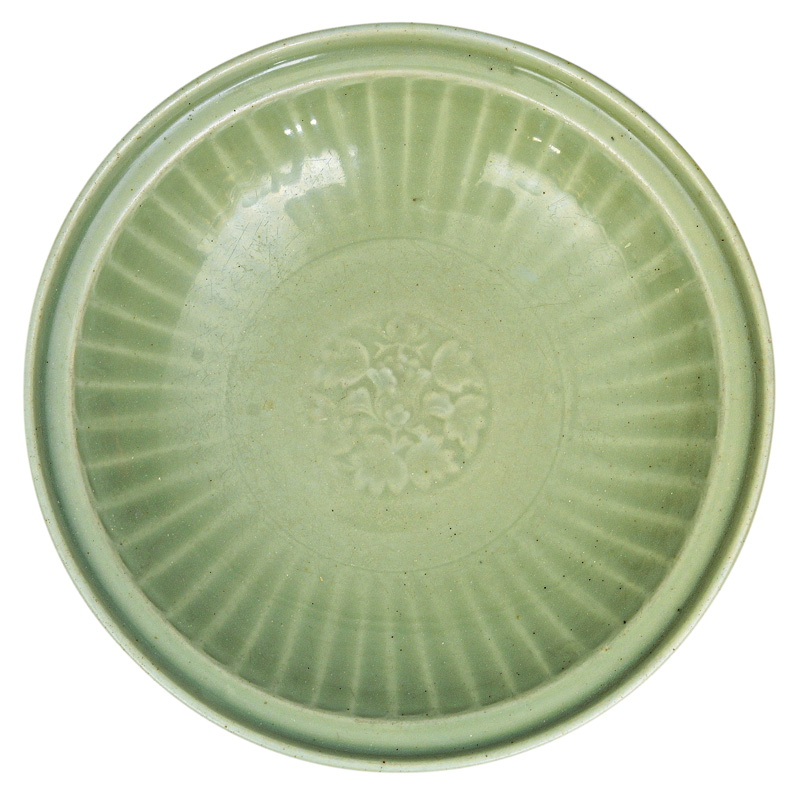 A celadon bowl with fine flower ornament
