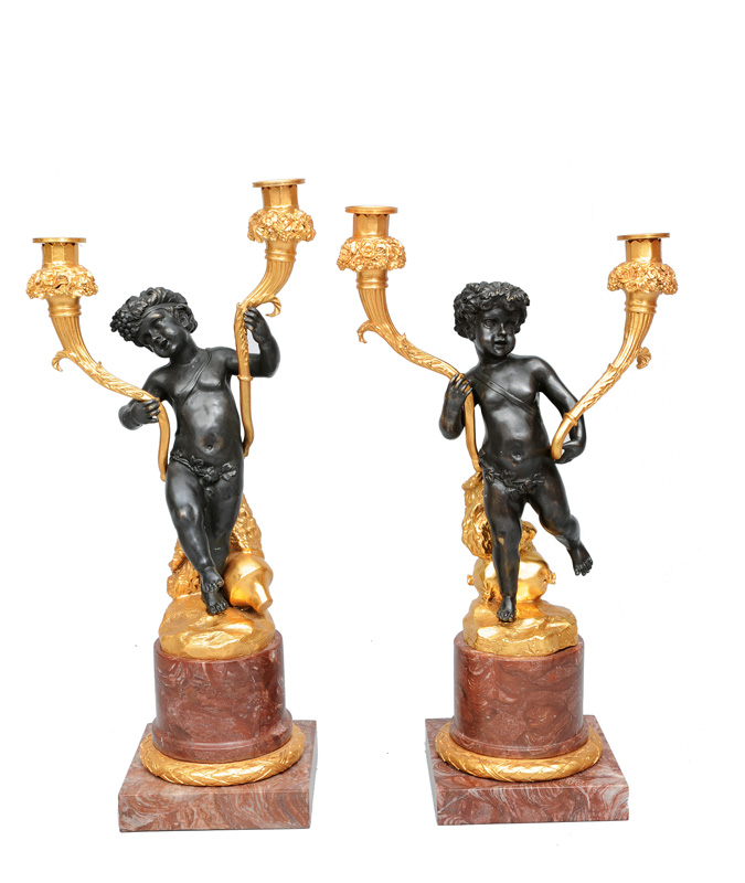 A pair of  girandoles with putti in the style of Louis-Quinze