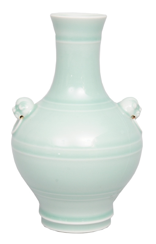 A celadon vase with plastical handles