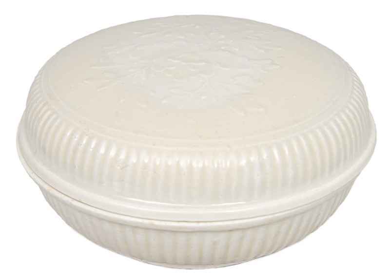 A cover box with delicate relief decoration