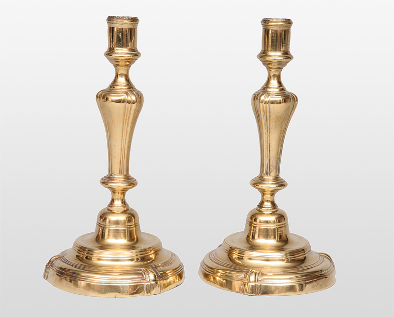A pair of Baroque candlesticks