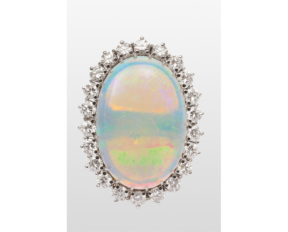 An opal diamond ring
