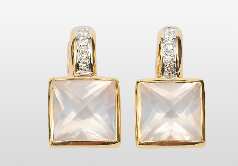 A pair of rose quarz diamond earrings