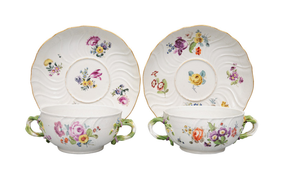 A pair of tureens on presentoir with flower painting