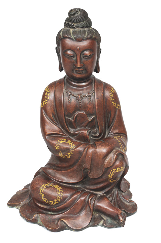 A tall bronze Guanyin with gold and silver inlays