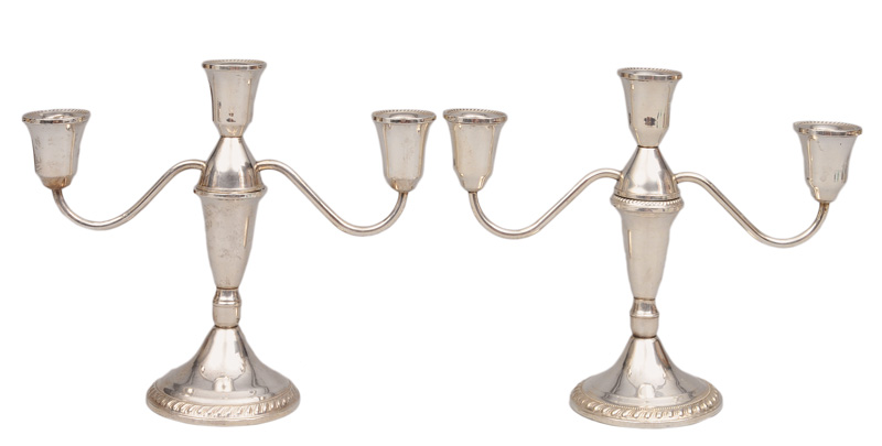 A pair of table candleholders