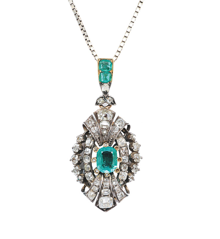 An Art-déco-pendant with diamonds and emeralds