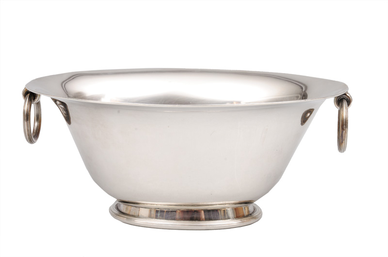 A oval bowl with strap-handles
