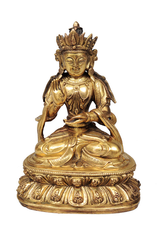 A bronze Bodhisattva on a lotus base