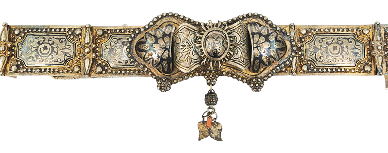 A silver belt with niello ornament