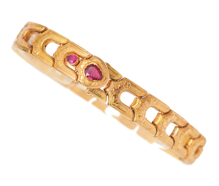 A russian golden bracelet with rubies