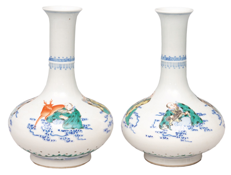 A pair of fine Famille-Verte bottle vases with deities