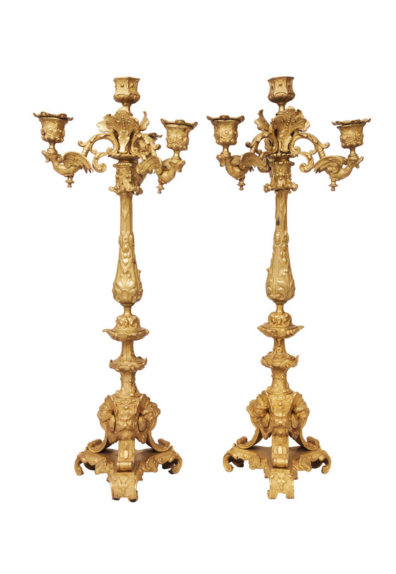 A pair of splendid candle holders with renaissance ornaments