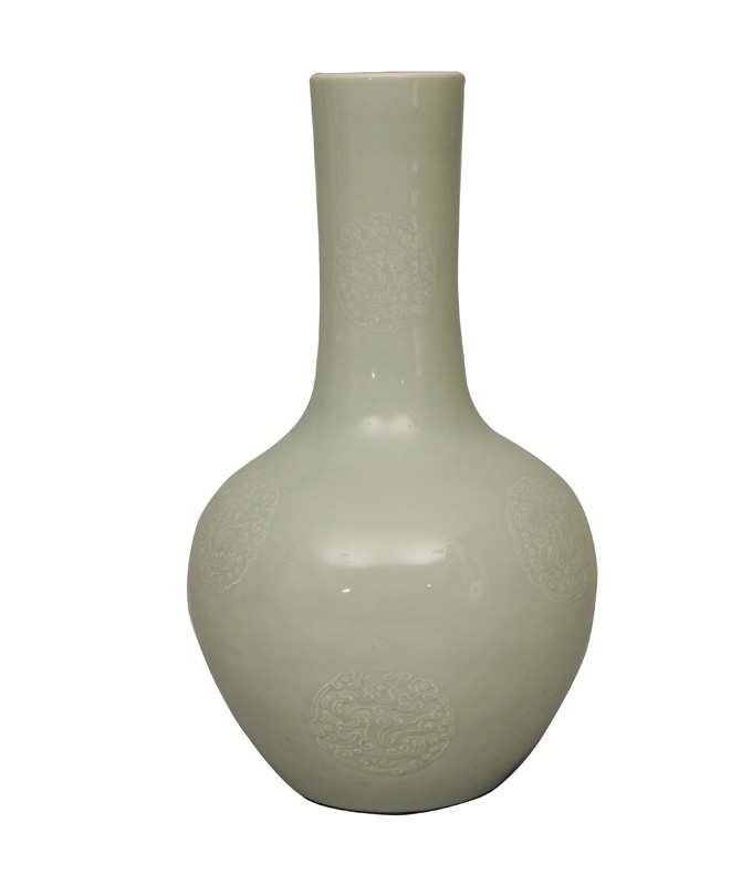 A very fine and rare celadon vase with carved decoration