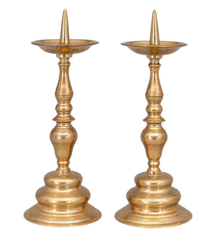 A pair of small baroque candleholders