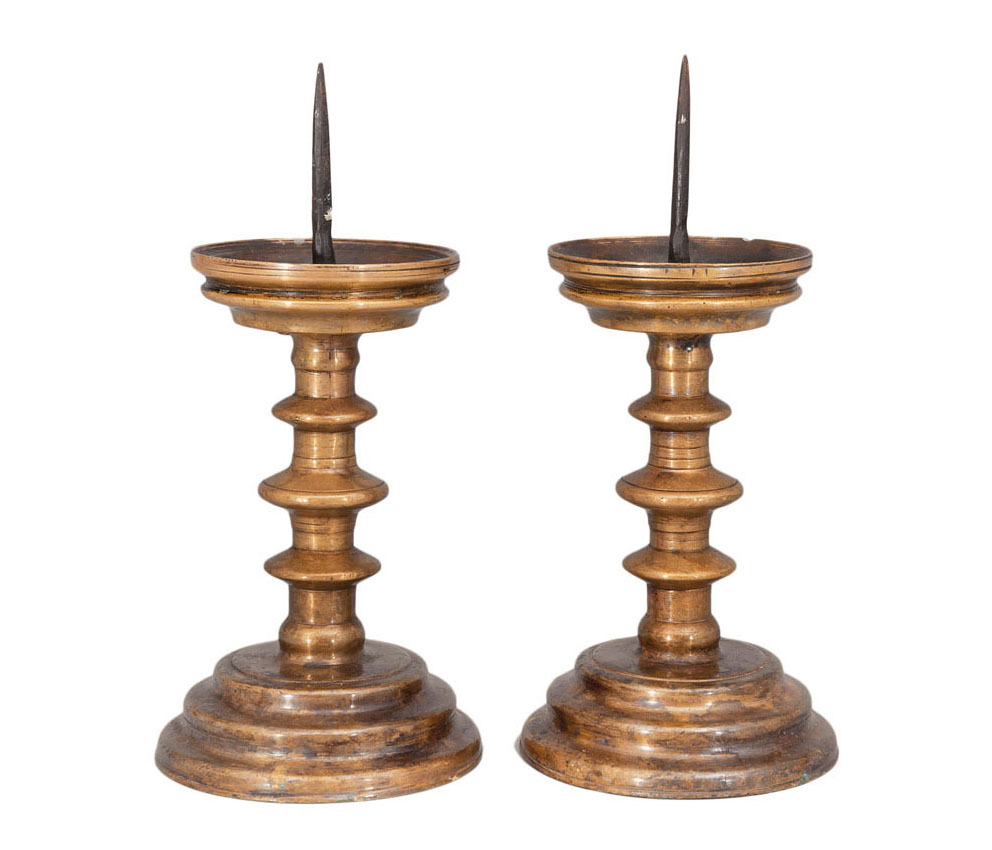 A pair of late Gothic candle holders