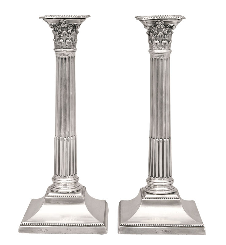A pair of Victorian candlesticks in the classical style