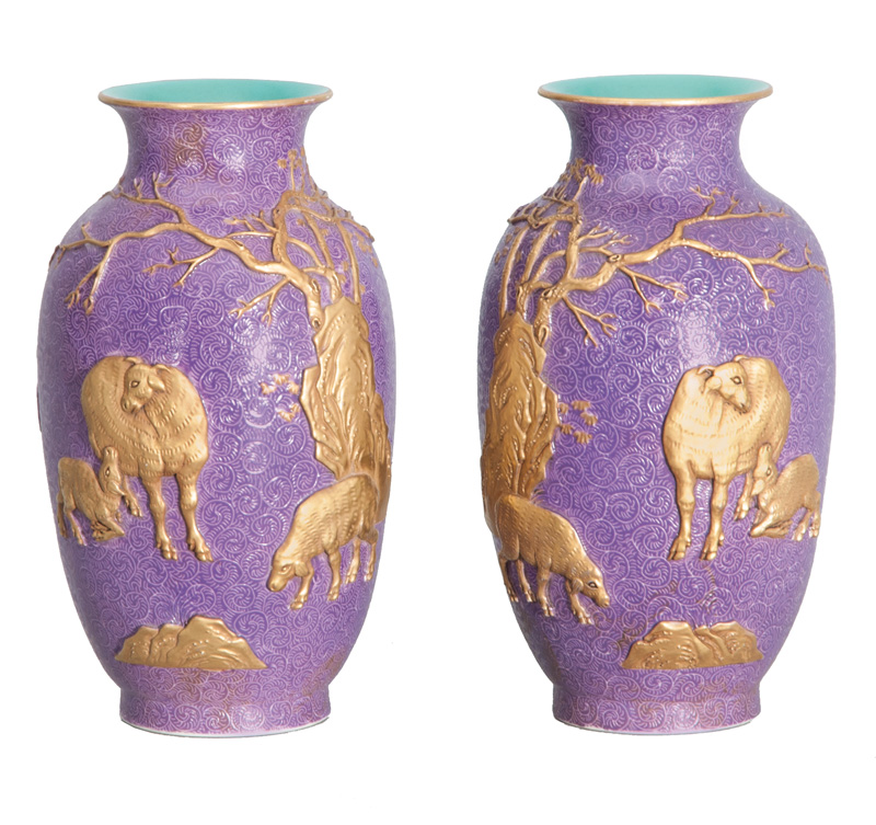 A pair of purple-ground vases with gold relief