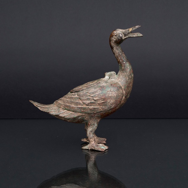 A fine gold and silver inlaid bronze censer in the shape of a goose