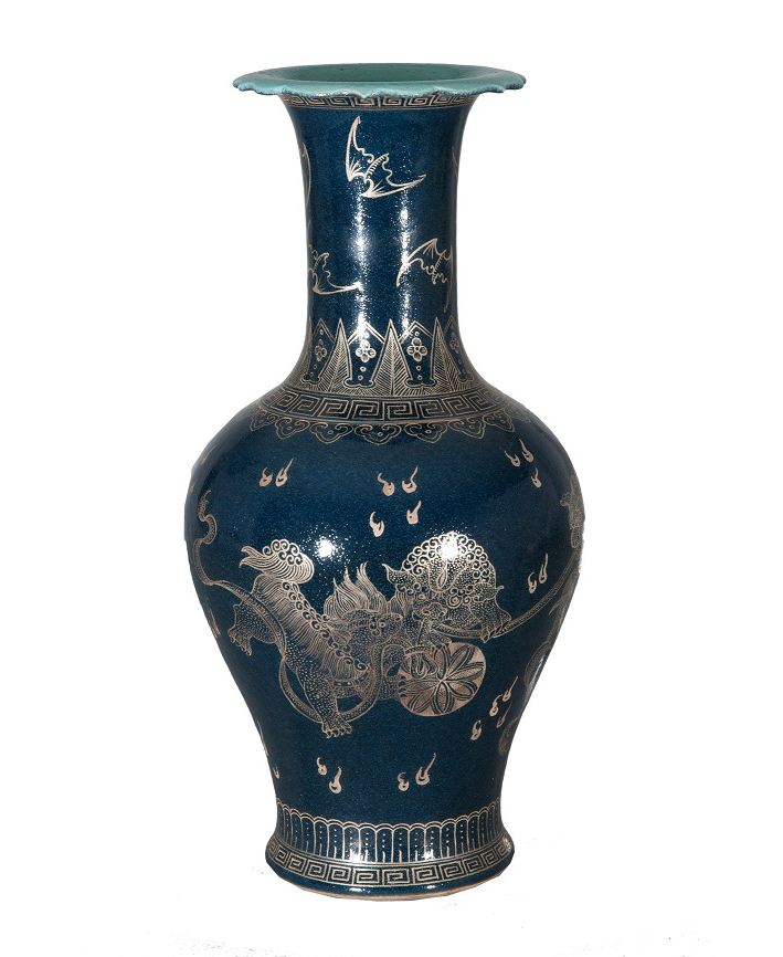 A deep blue baluster vase with playing Fô-dogs