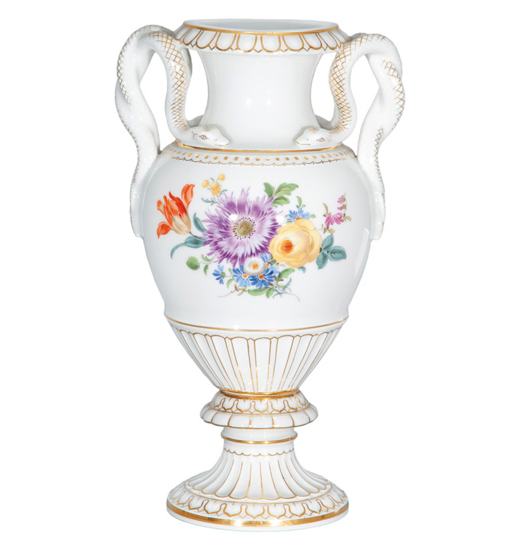A vase with snake handles and flower painting