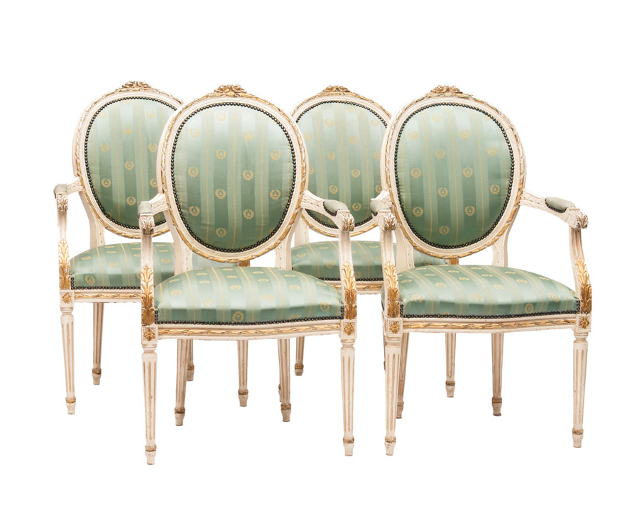 A set of 4 armchairs in the Louis Seize Style