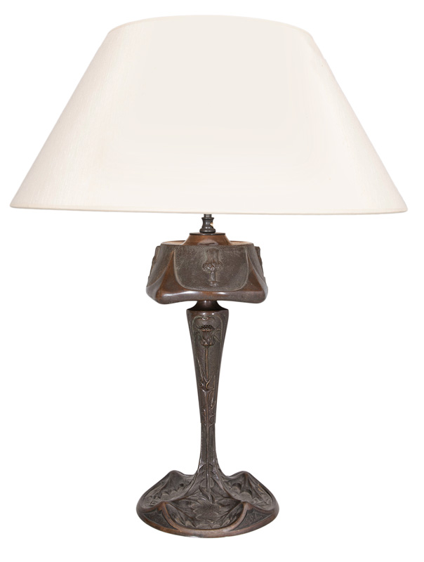 An Art Nouveau lamp foot with thistel