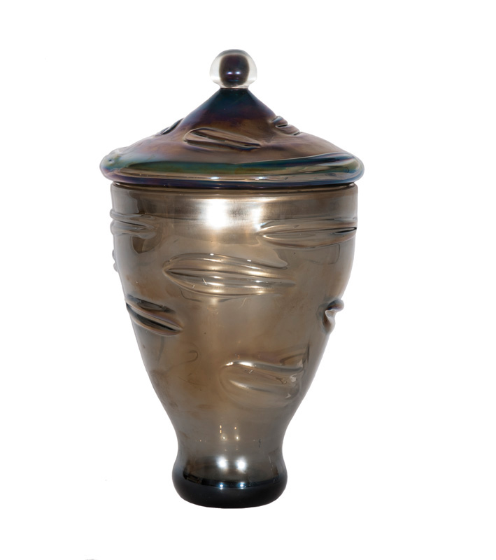 A hug iridescent vase with cover