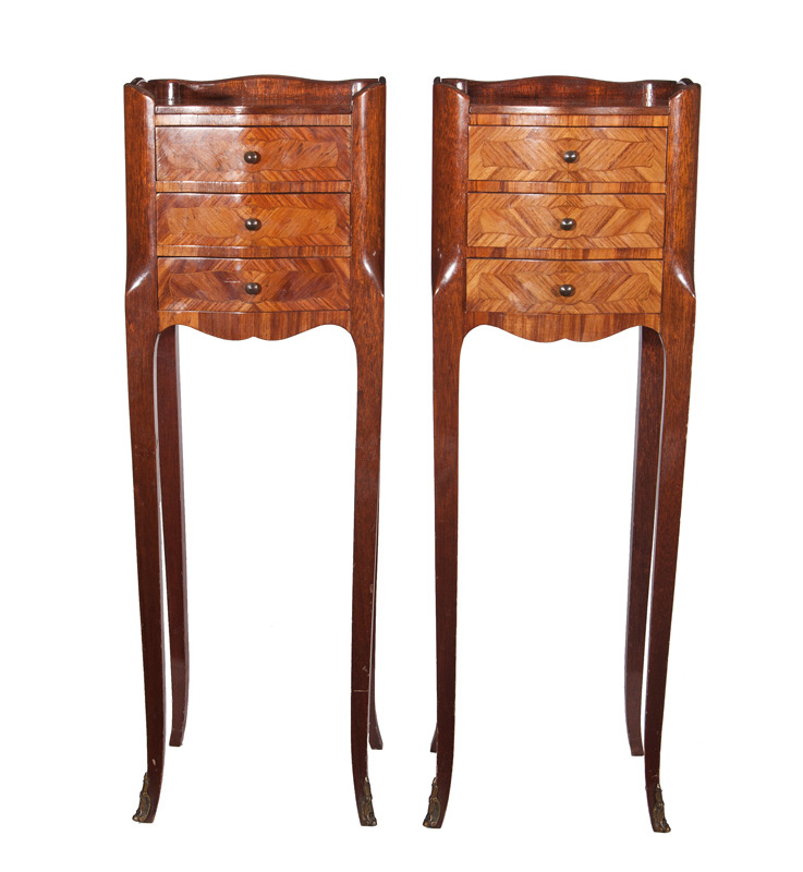 A pair of petite chest of drawers in the style of Louis Quinze