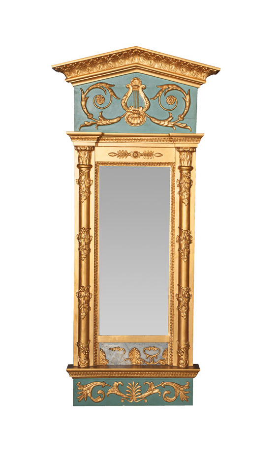 An Empire mirror with lyre decor