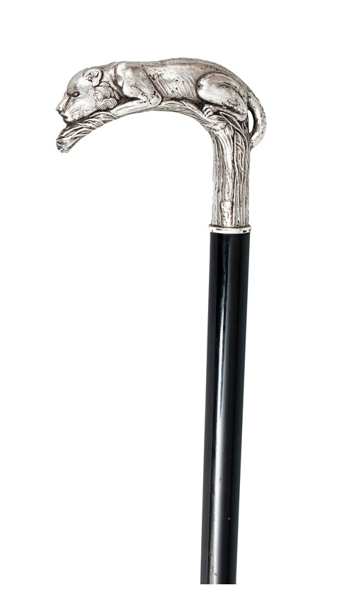 An elegant walking stick with pommel shaped as a jaguar An elegant walking stick with pommel shaped as a jaguar