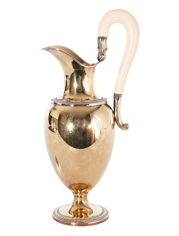 A gilded water jug of Empire style
