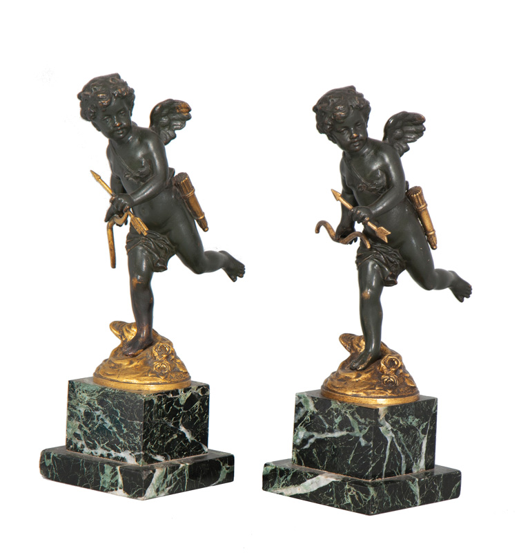 A pair of decorations with Cupid A pair of decorations with Cupid