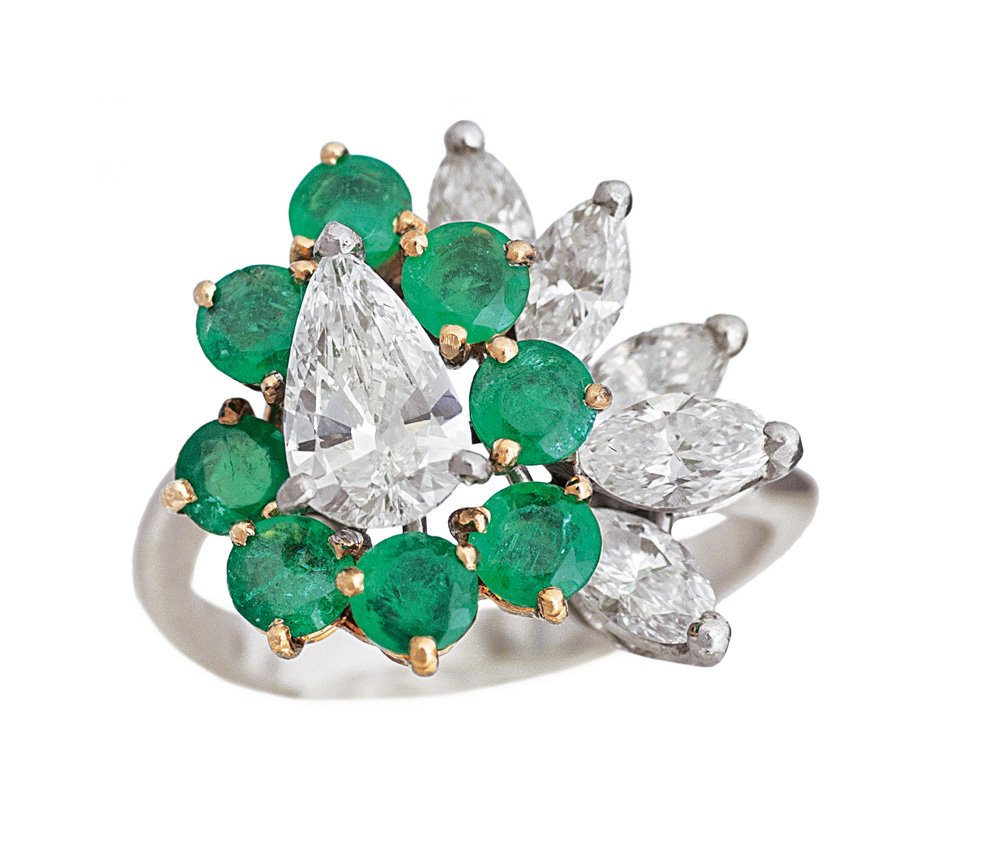 An emerald diamond ring
