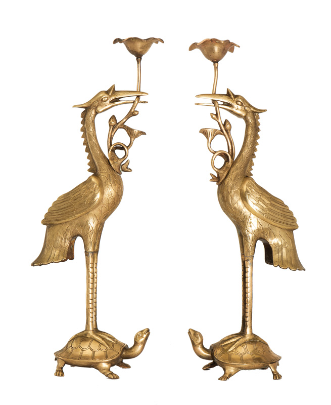 A pair of exotic 'animal' candlesticks