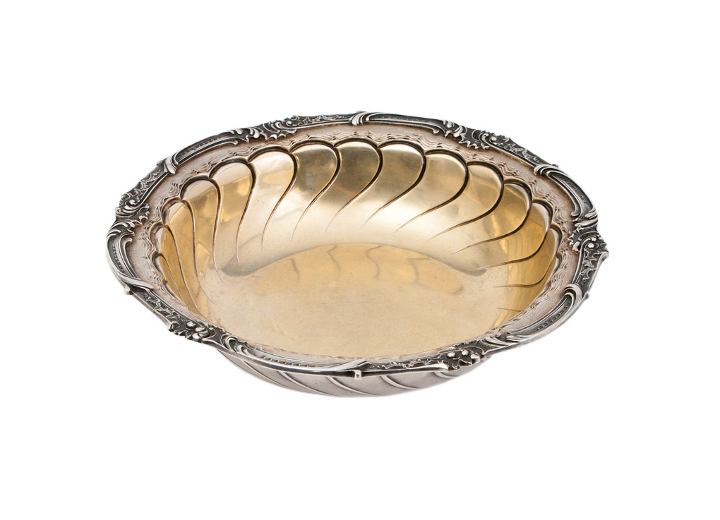 A parcel-gilt silver bowl of Rococo style
