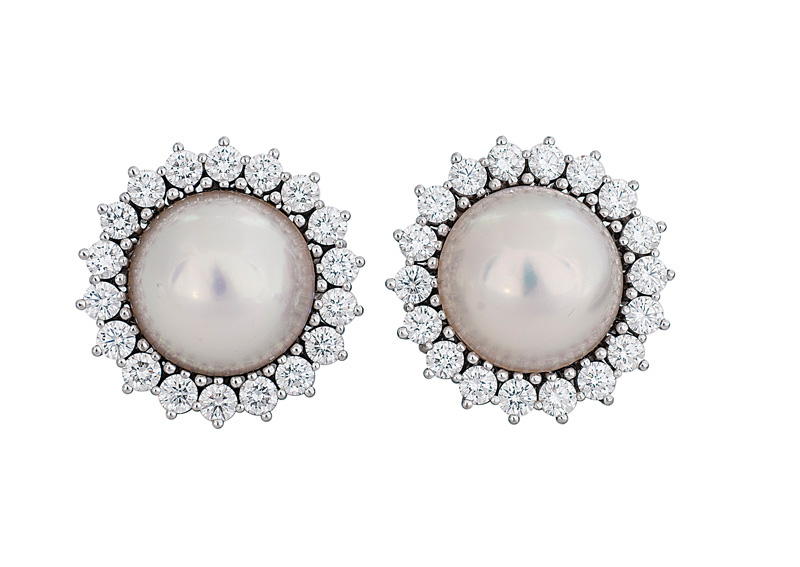 A pair of mabé pearl diamond earrings