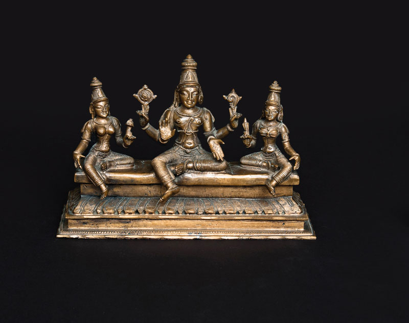 A bronze trias 'Vishnu and his consorts Bhu and Sri'