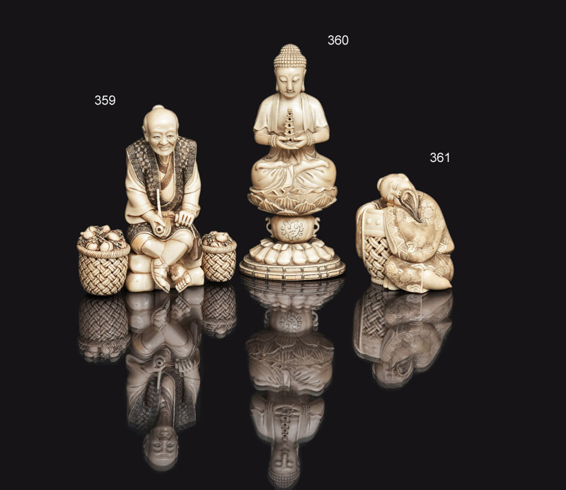 An ivory Okimono 'Buddha with pagoda'