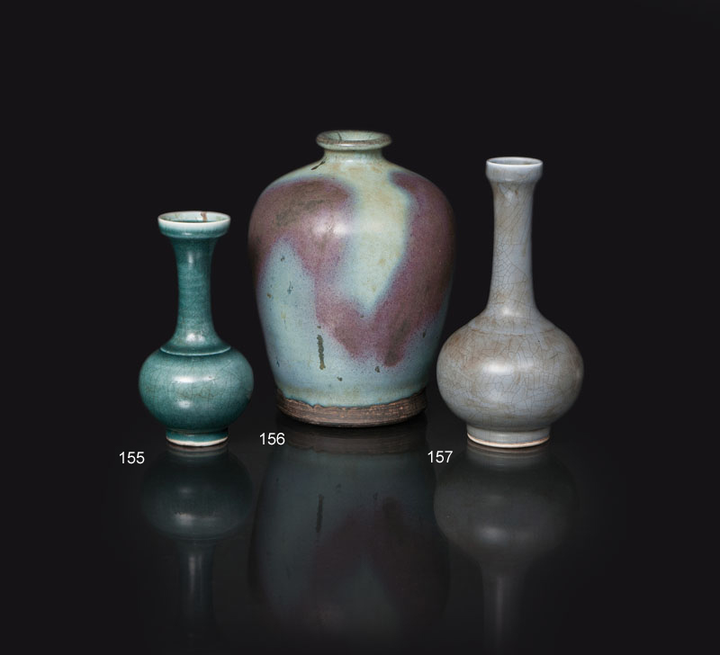 A small bottle vase with sea green glaze