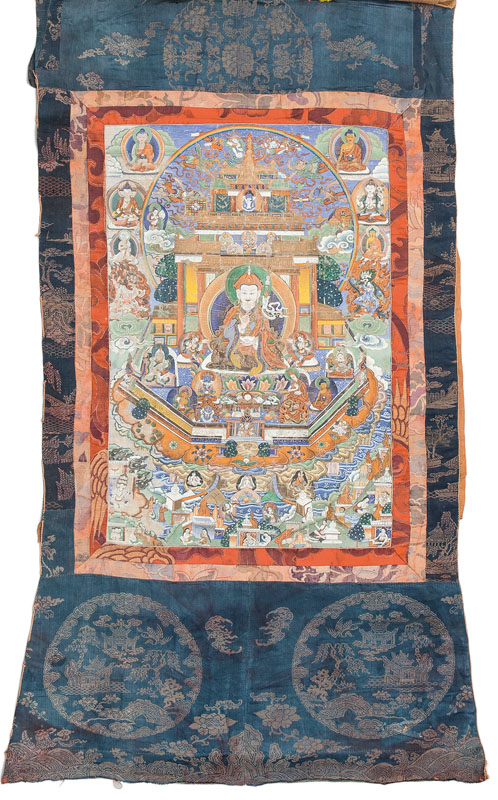 A thangka 'Padmasambhava in the glorious copper-mountain paradise' A thangka 'Padmasambhava in the glorious copper-mountain paradise'