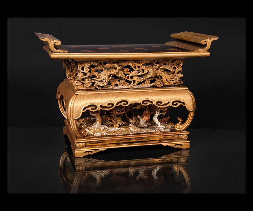 A fine lacquered altar table with mythological scenes