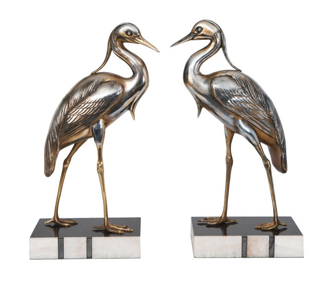 A pair of animal figures 'Swaggering Heron'