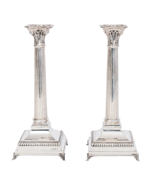 A pair of candlesticks of classical style