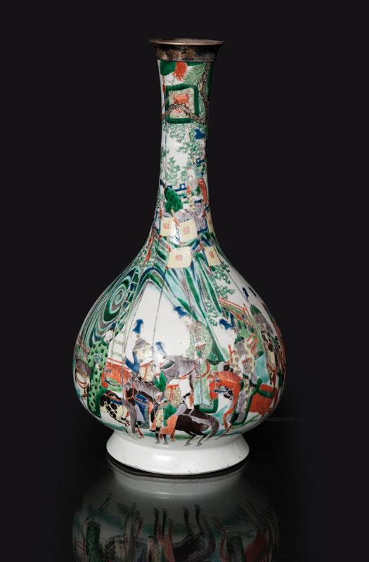 A sumptuous 'Famille Verte' bottle vase with horsemen and falconer